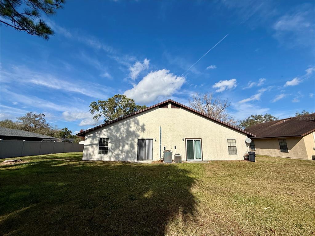 758 Warrenton Road Winter Park, FL 32792 - Photo 51 of 52 a view of a white house with a yard