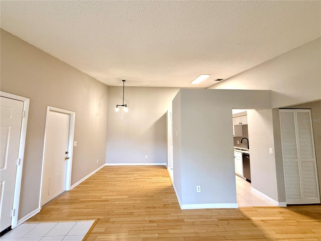 758 Warrenton Road Winter Park, FL 32792 - Photo 8 of 52 a view of a big room with wooden floor and a bathroom