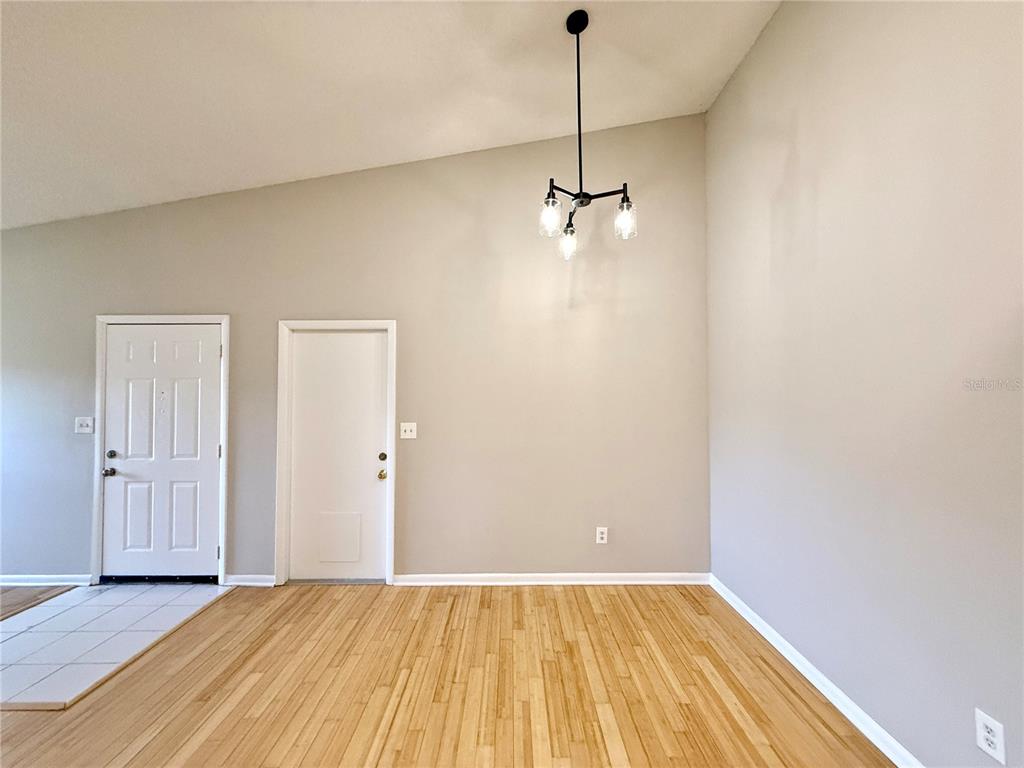 758 Warrenton Road Winter Park, FL 32792 - Photo 10 of 52 a view of empty room with wooden floor