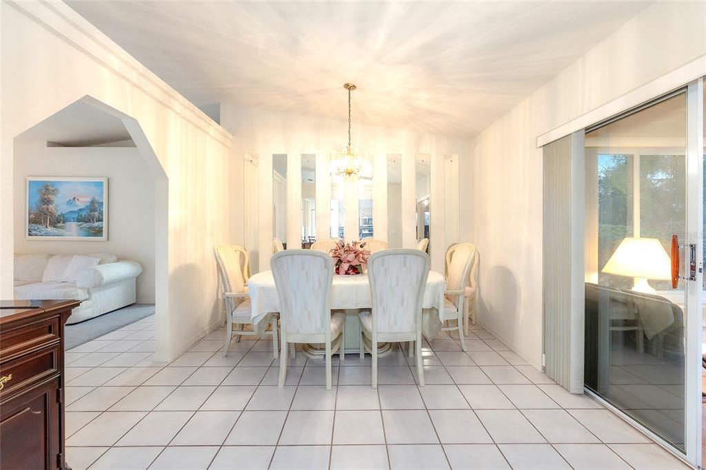 4513 Southwest 158th St Road Ocala, FL 34473 - Photo 11 of 41 a dining room with furniture and window