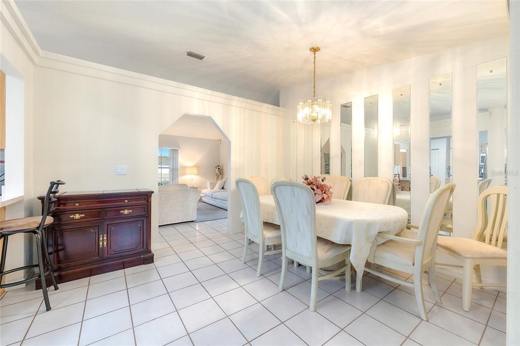 4513 Southwest 158th St Road Ocala, FL 34473 - Photo 13 of 41 a dining room with furniture and window