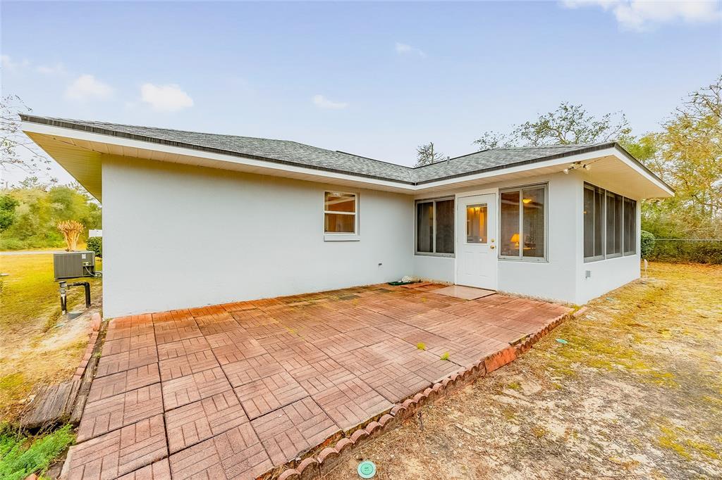4513 Southwest 158th St Road Ocala, FL 34473 - Photo 31 of 41 a view of a house with a outdoor space