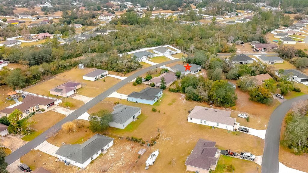 4513 Southwest 158th St Road Ocala, FL 34473 - Photo 39 of 41 an aerial view of residential houses with yard