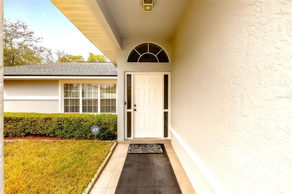 4513 Southwest 158th St Road Ocala, FL 34473 - Photo 4 of 41 a front view of a house with a yard