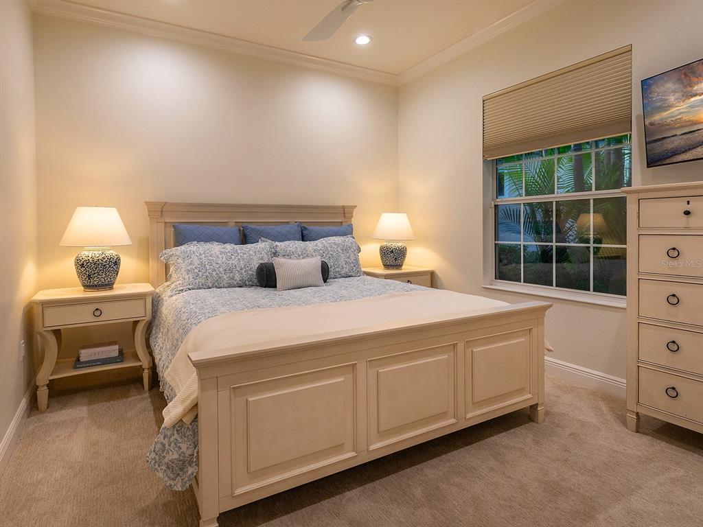 7431 Greystone Street Lakewood Ranch, FL 34202 - Photo 44 of 85 a bedroom with a bed and a window