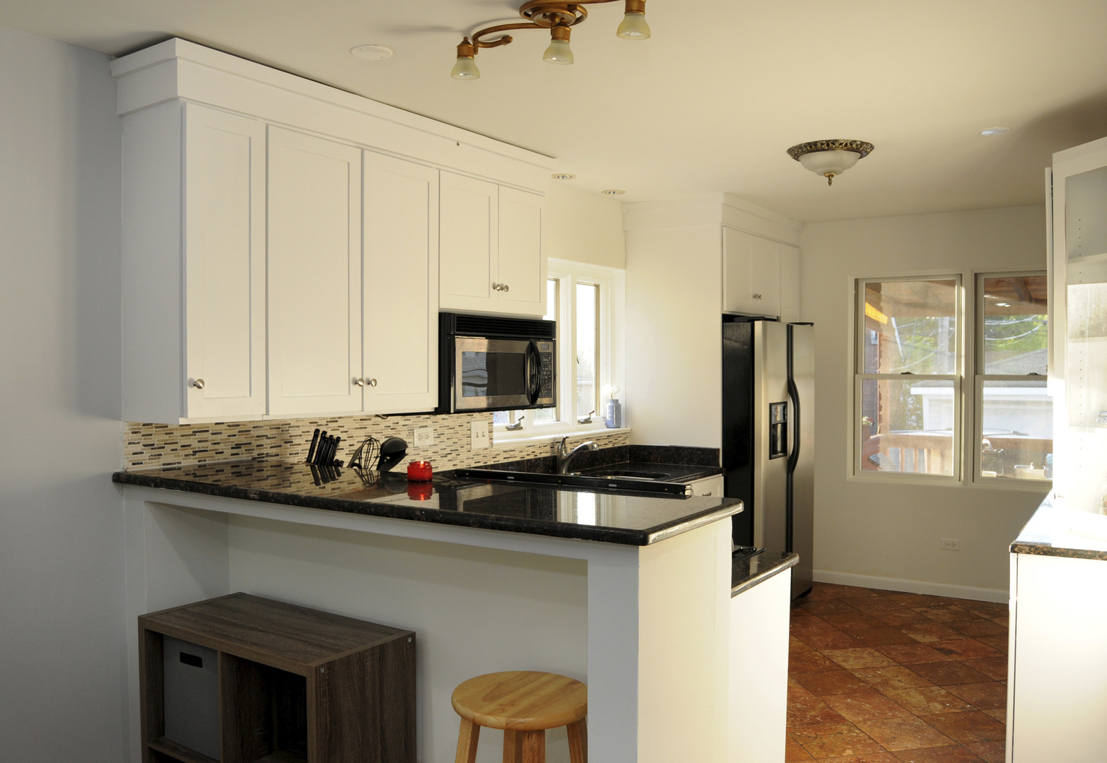 9038 South Forestview Drive North Riverside, IL 60546 - Photo 6 of 24 a kitchen with a sink and a stove
