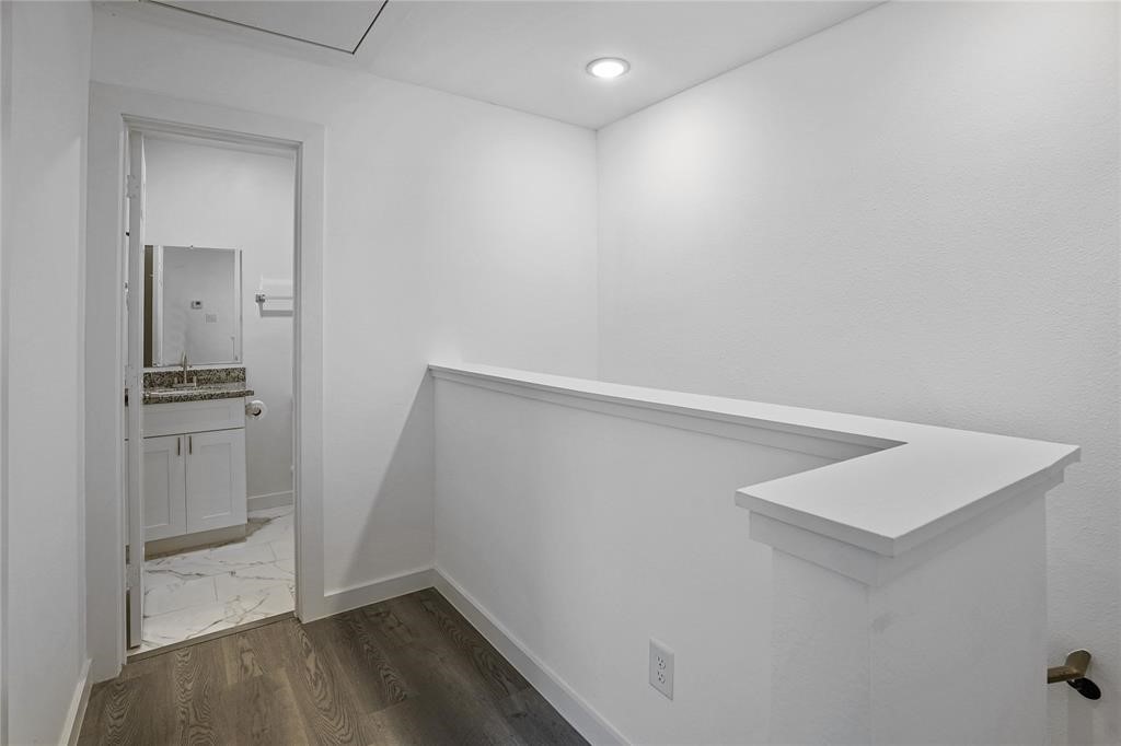 9313 Hillis Street, Unit A Houston, TX 77028 - Photo 7 of 14 wooden floor in an empty room