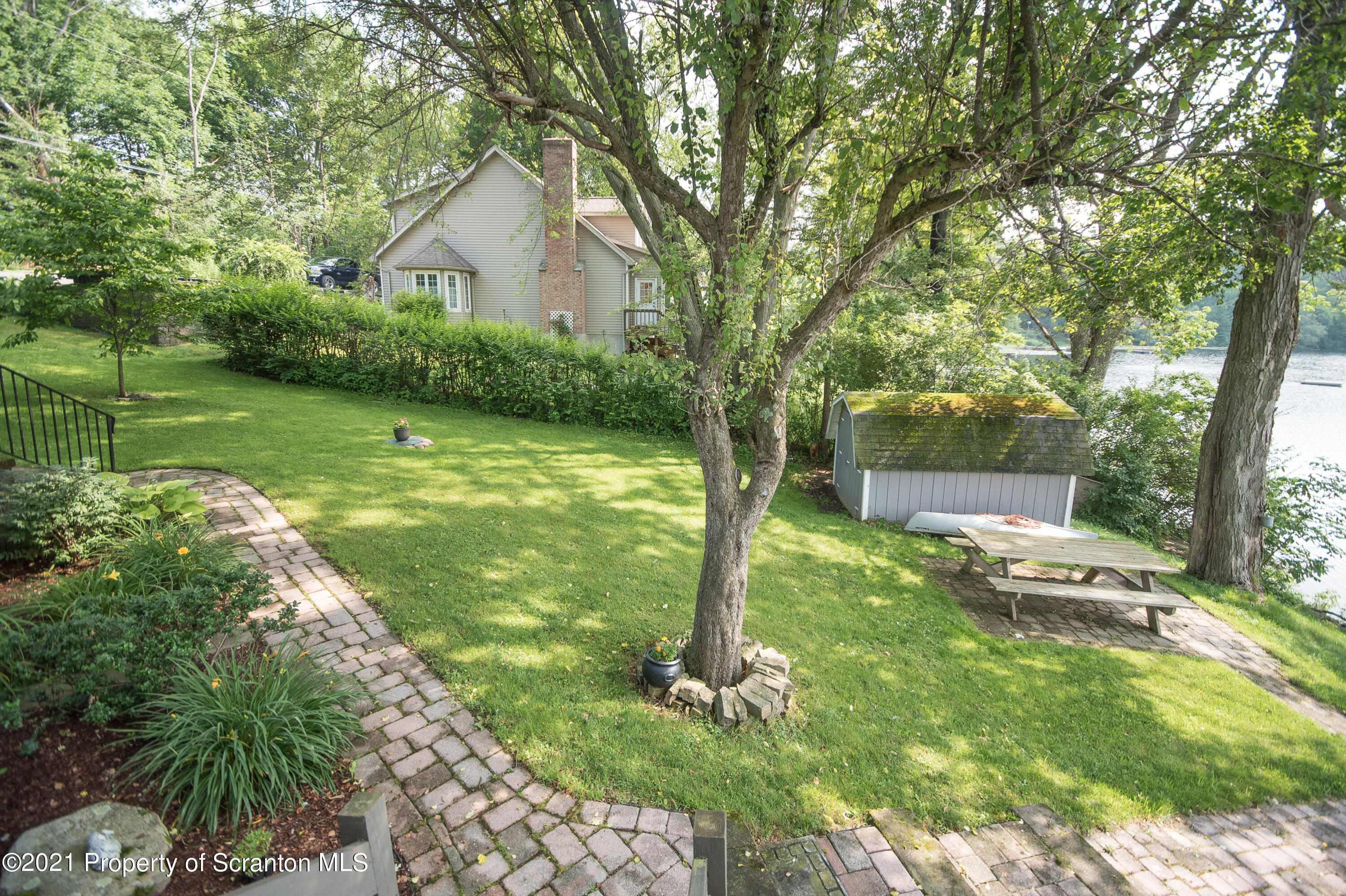34 Taylor Farm Road Union Dale, PA 18470 - Photo 12 of 38 a view of backyard with a garden and trees