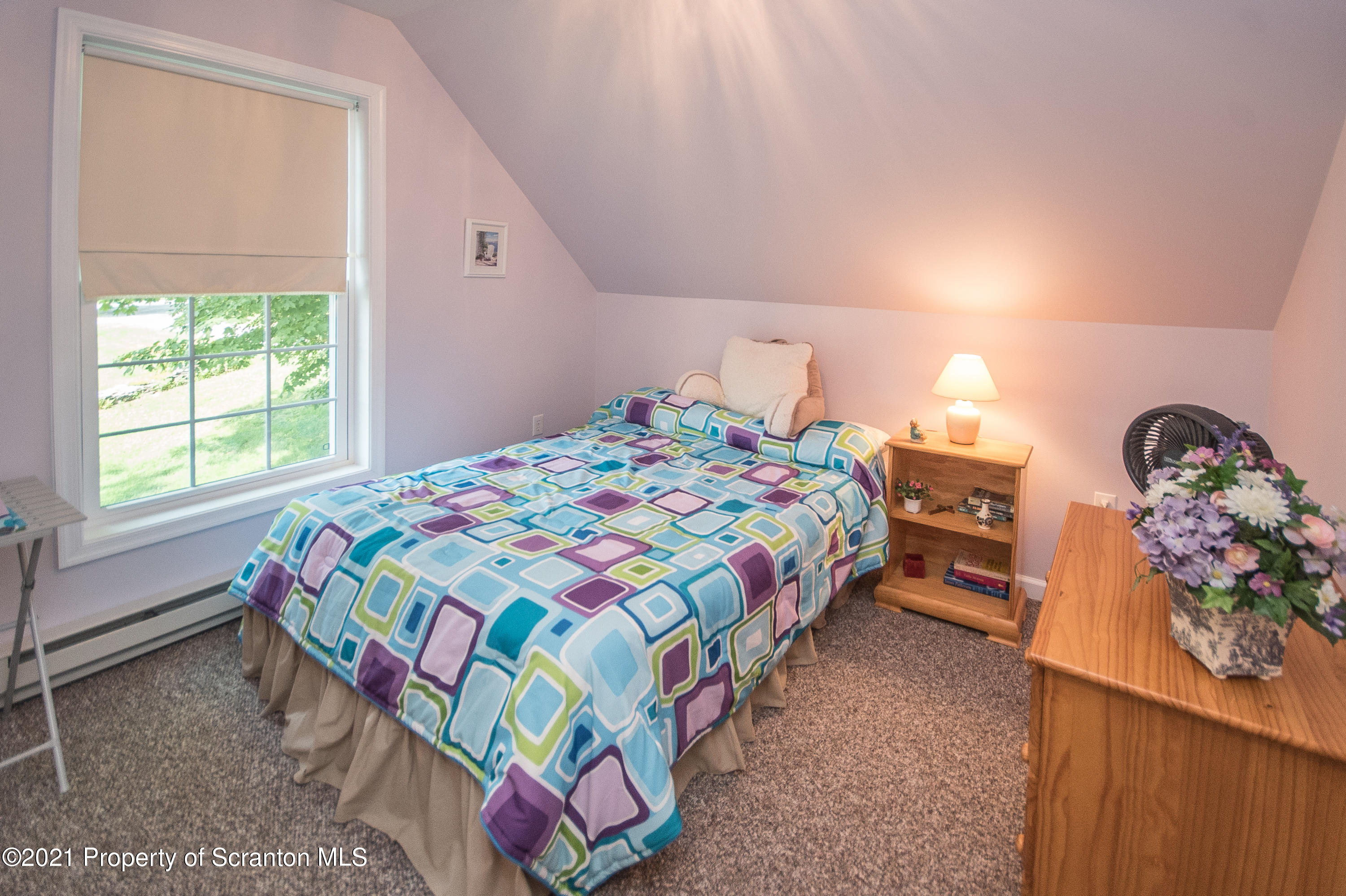 34 Taylor Farm Road Union Dale, PA 18470 - Photo 35 of 38 a bedroom with a bed and a window