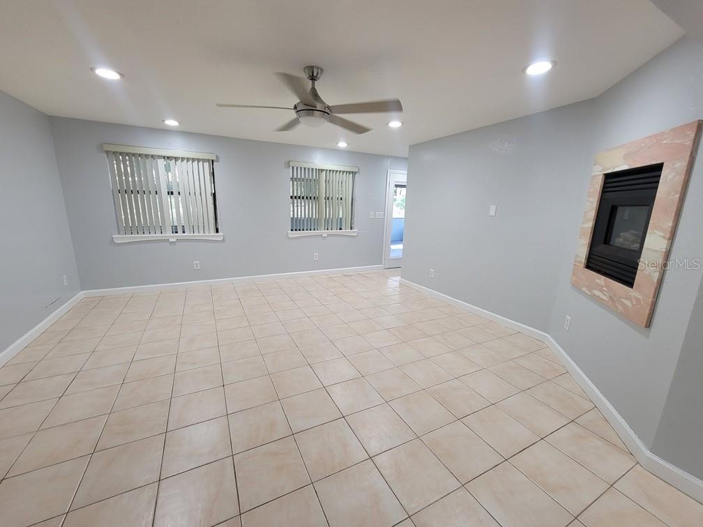 11633 Fox Run Port Richey, FL 34668 - Photo 14 of 33 a big room with windows