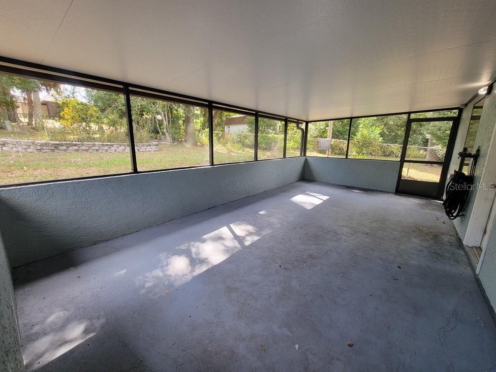 11633 Fox Run Port Richey, FL 34668 - Photo 31 of 33 a view of an empty room with a large window