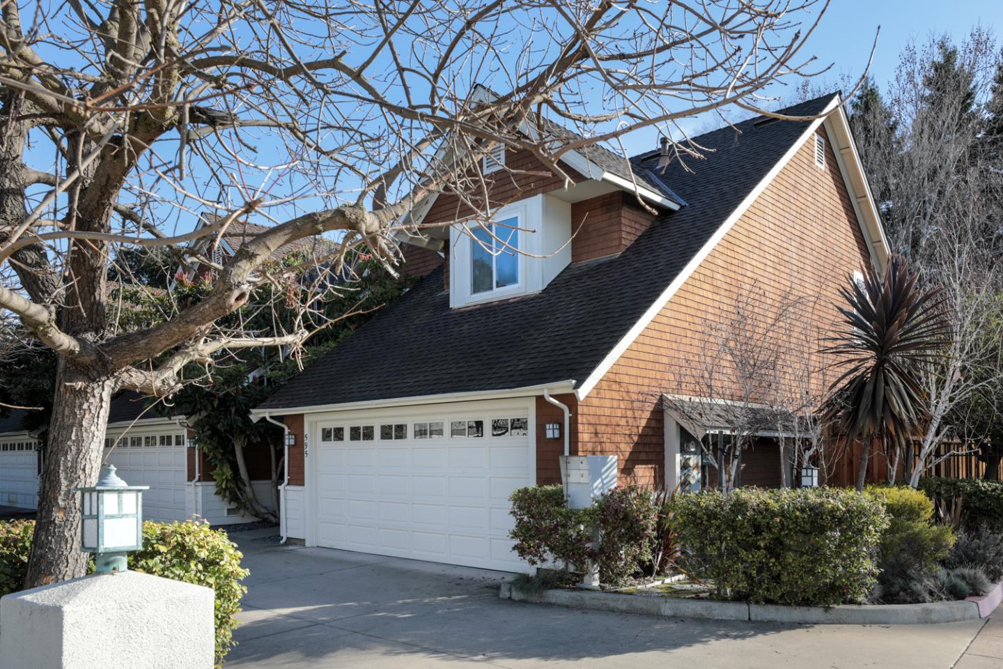 595 Willow Road Menlo Park, CA 94025 - Photo 2 of 28 a view of house with a tree