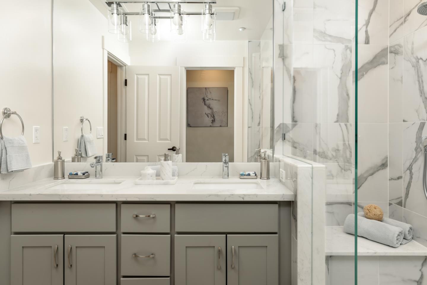 595 Willow Road Menlo Park, CA 94025 - Photo 23 of 28 a bathroom with a double vanity sink and a mirror