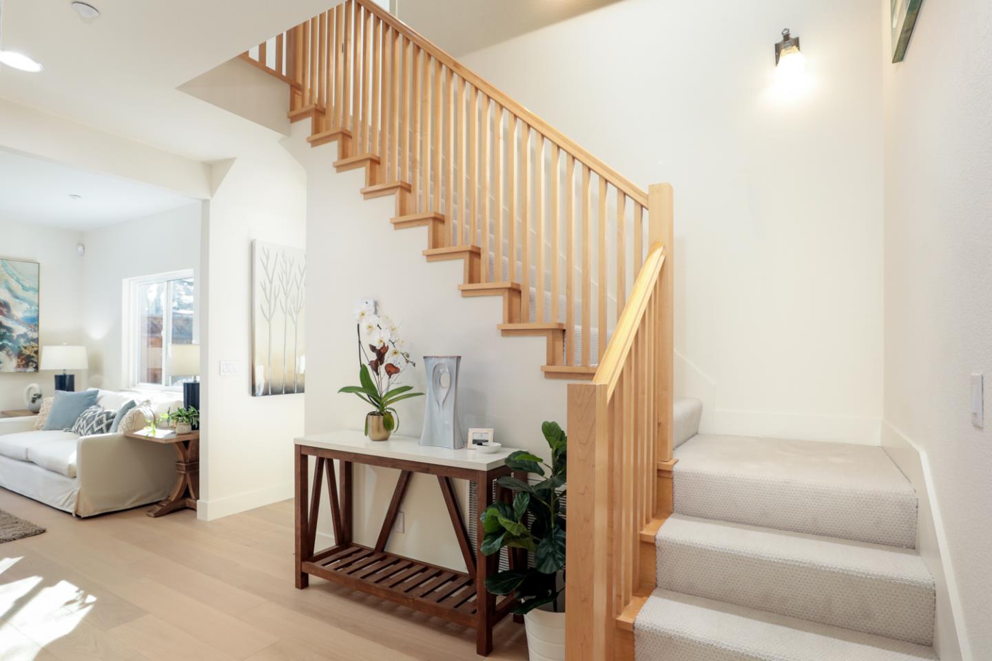 595 Willow Road Menlo Park, CA 94025 - Photo 4 of 28 a living room with furniture and a stairs