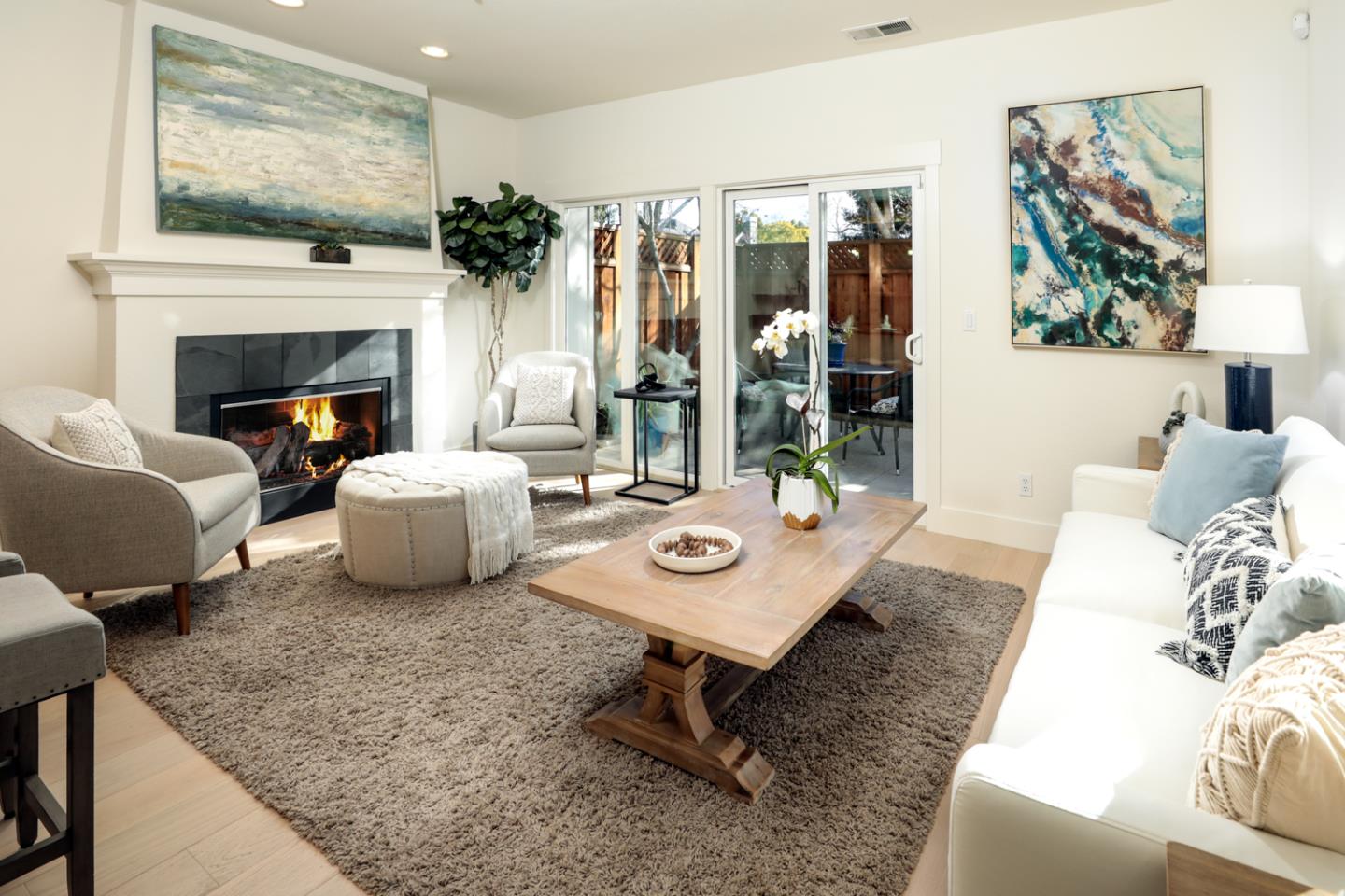 595 Willow Road Menlo Park, CA 94025 - Photo 7 of 28 a living room with furniture and a fireplace