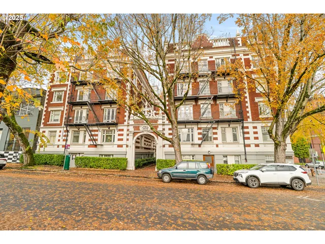 a view of front a house with a parking space