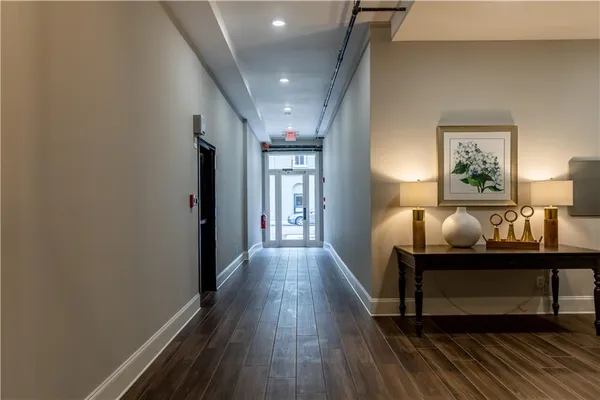 a view of workspace with wooden floor