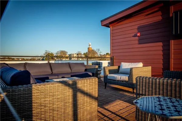 a outdoor living space with patio furniture and a potted plant