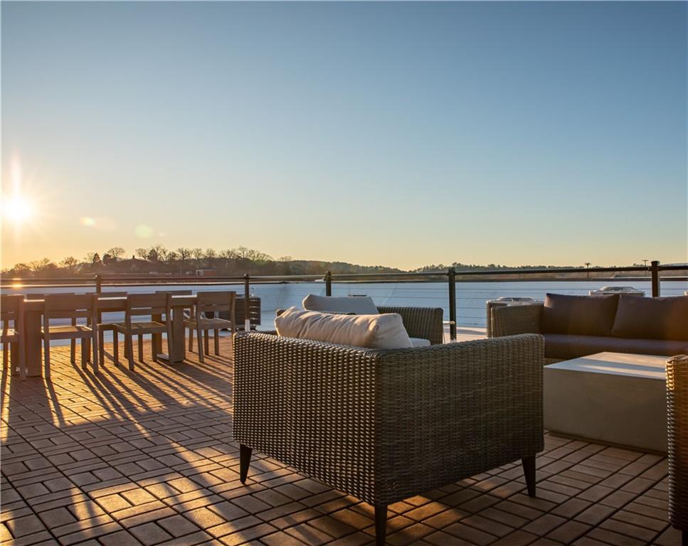 1 East 3rd Avenue, Unit 302 Rome, GA 30161 - Photo 34 of 36 a terrace with outdoor seating