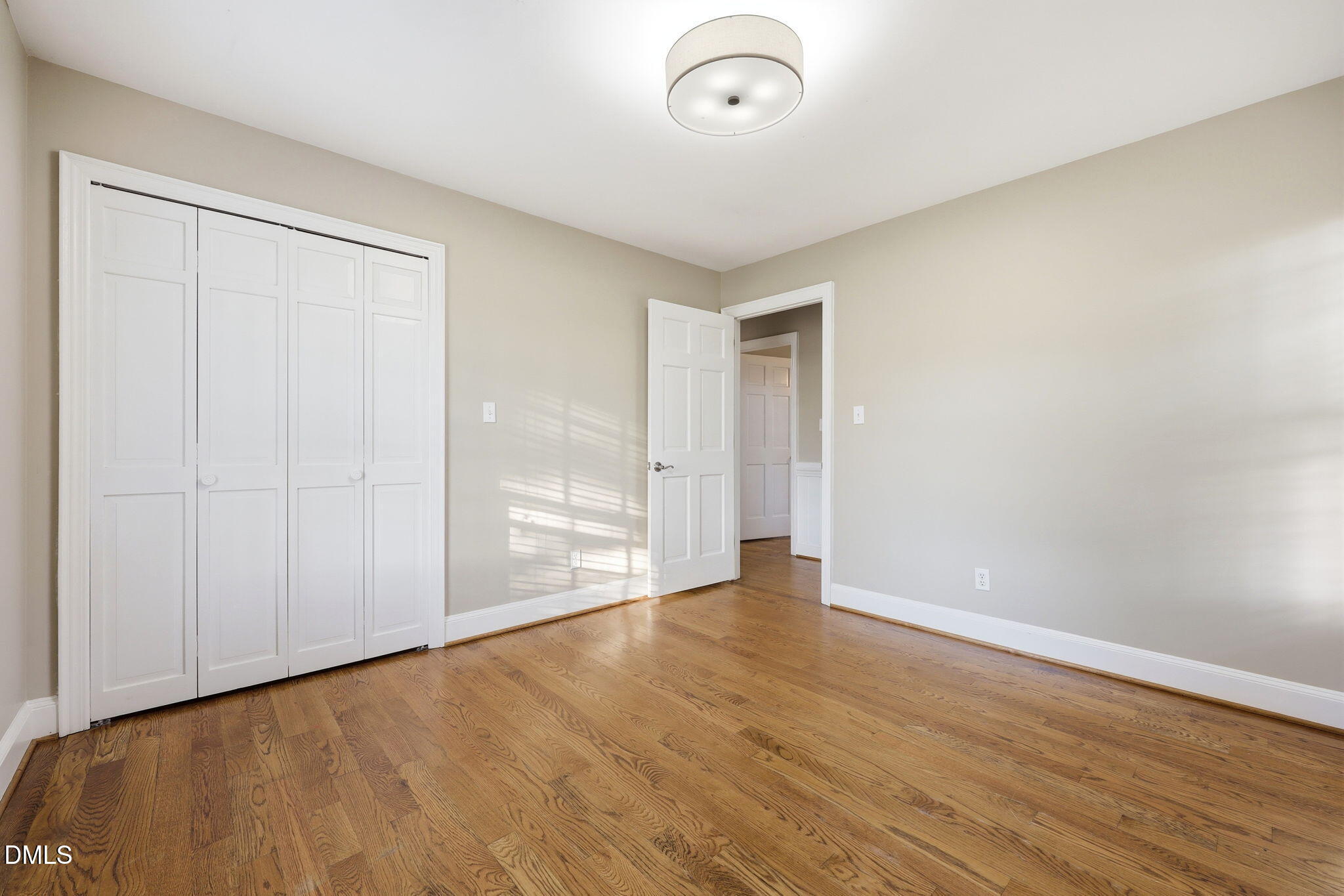 1130 Prospect Church Road Dunn, NC 28334 - Photo 33 of 47 a view of an empty room with wooden floor