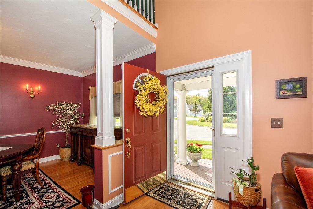 53 Hemlock Circle, Unit 53 Hanover, MA 02339 - Photo 3 of 27 a living room with furniture and a window