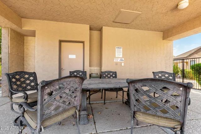 a view of a swimming pool with lounge chair