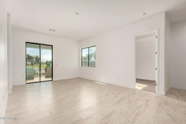 an empty room with windows