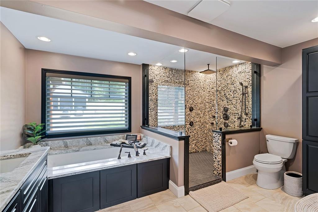 13399 Treasure Lake Road Du Bois, PA 15801 - Photo 17 of 49 a bathroom with a double vanity sink toilet and shower