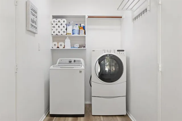 a utility room with dryer and washer