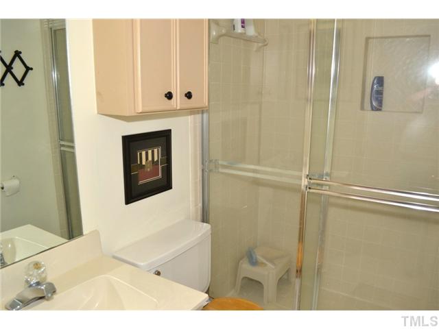901 Streamer Court Raleigh, NC 27614 - Photo 15 of 21 Third floor also features a full bathroom with tile floor and shower with tile surround.