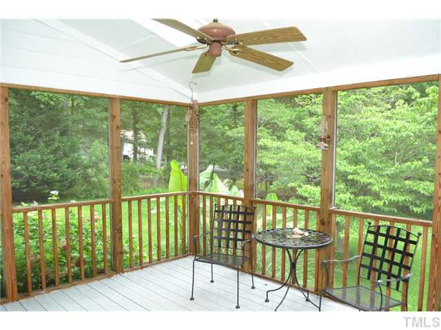 901 Streamer Court Raleigh, NC 27614 - Photo 17 of 21 Screened porch overlooking the backyard with ceiling fan and skylights