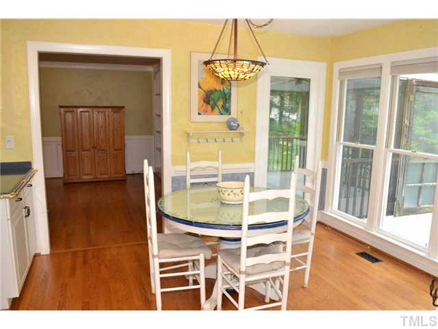 901 Streamer Court Raleigh, NC 27614 - Photo 5 of 21 Breakfast area with huge windows and a door to the deck