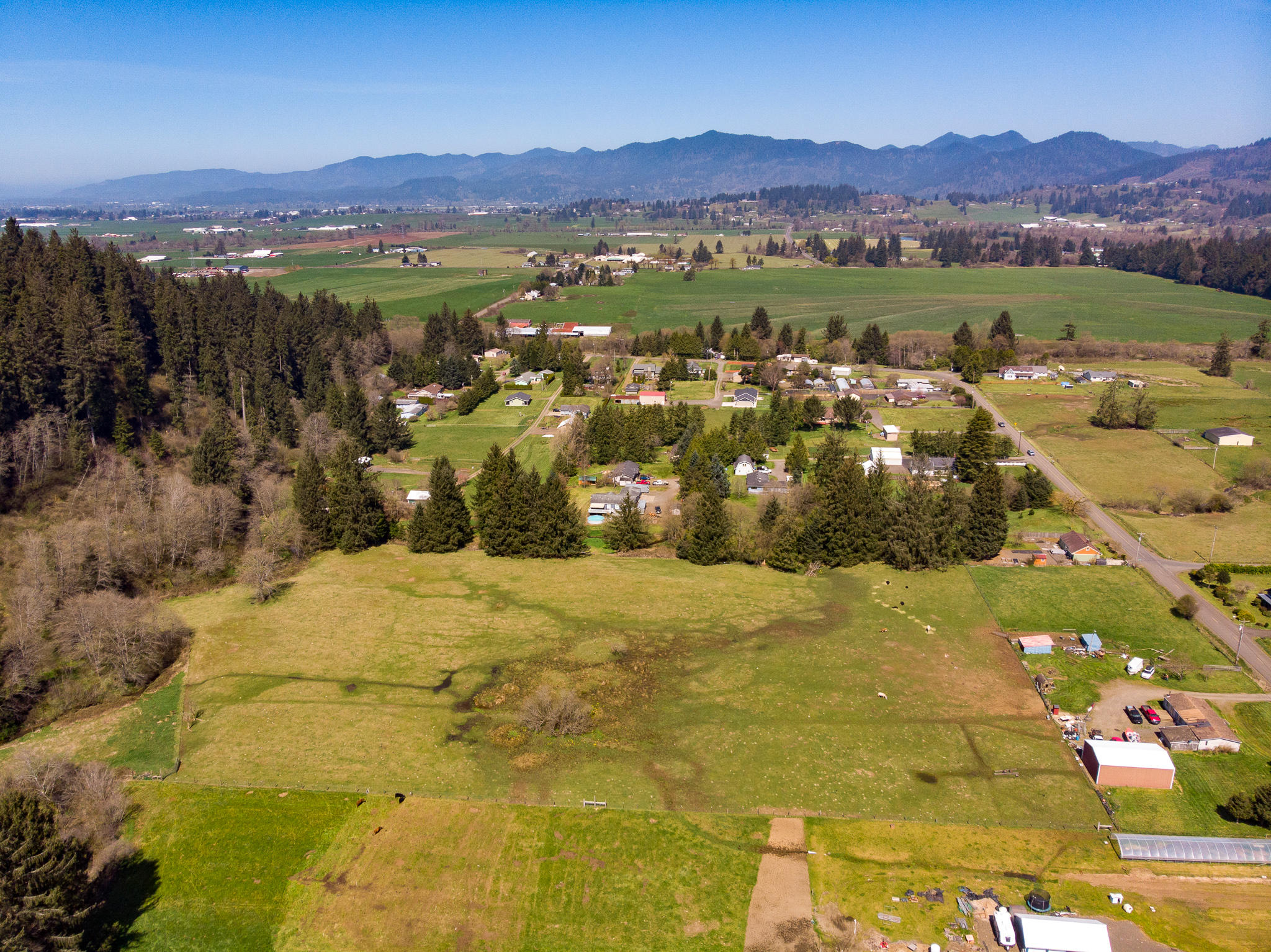 5300 Brickyard Road Tillamook, OR 97141 - Photo 7 of 14 a view of a city with mountain