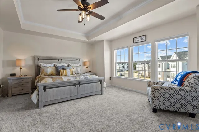 a bed room with a bed and a couch