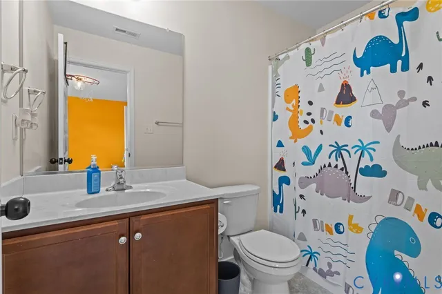 a view of a balcony with furniture