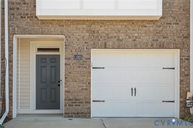 a view of a large building with a large pool
