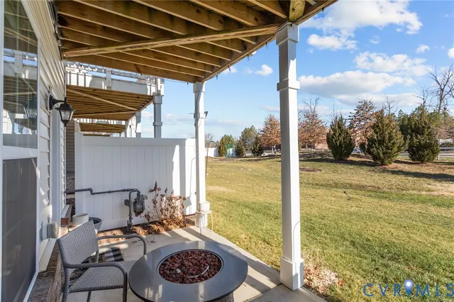 a front view of a house with trees