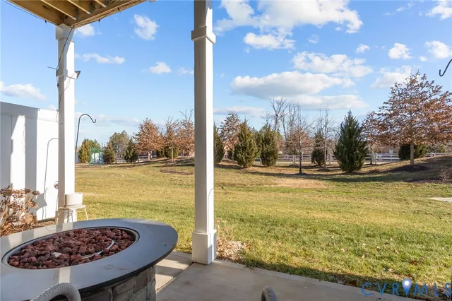 a view of residential houses with outdoor space and swimming pool