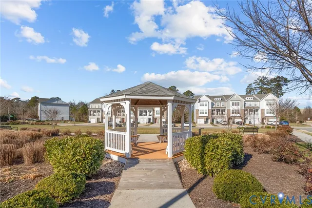 a front view of a building with a lot of traffic signal lights