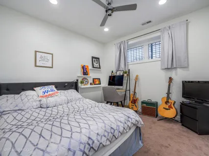 a bedroom with a bed and furniture