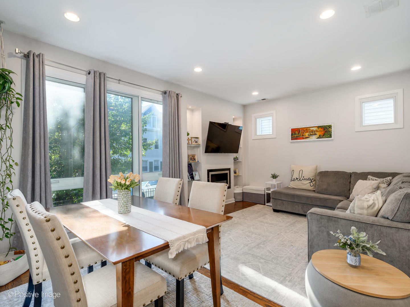 2139 North Bingham Street Chicago, IL 60647 - Photo 6 of 24 a living room with furniture flat screen tv and a large window