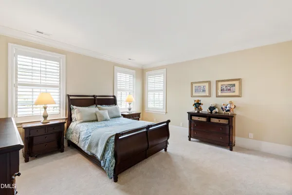 an aerial view of house with yard swimming pool and outdoor seating