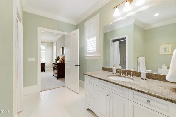 an aerial view of a house with outdoor space