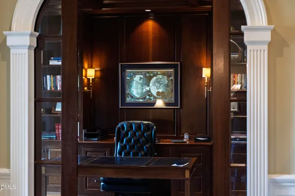 a view of a kitchen and dining room with wooden floor