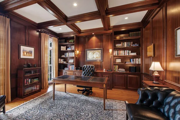 a kitchen with granite countertop a sink and cabinets