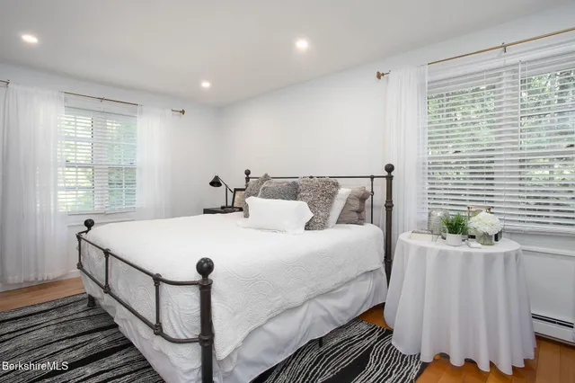 a bathroom with a sink double vanity and a bathtub