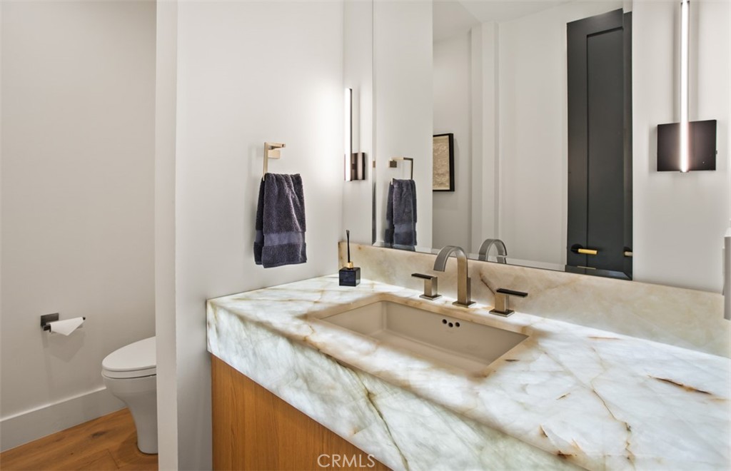 75 Ritz Cove Drive Dana Point, CA 92629 - Photo 22 of 49 a bathroom with a sink and a mirror