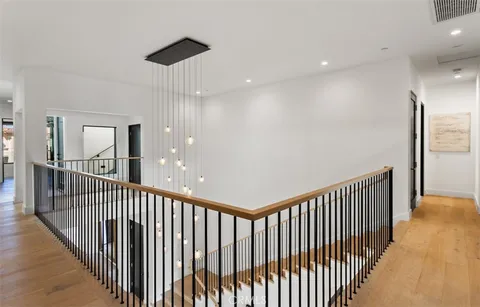 a view of a hallway view with staircase