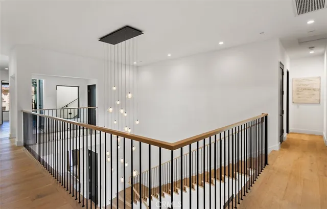 a view of a hallway view with staircase