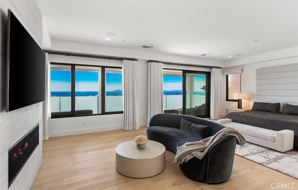 75 Ritz Cove Drive Dana Point, CA 92629 - Photo 28 of 49 a living room with furniture and a large window